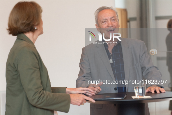 Actor Udo Kier greets Cologne Mayor Henriette Reker for his 80th birthday and signs the Golden Book at Cologne Town Hall in Cologne, Germany...