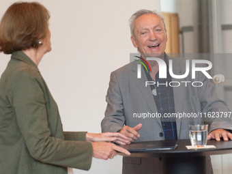 Actor Udo Kier greets Cologne Mayor Henriette Reker for his 80th birthday and signs the Golden Book at Cologne Town Hall in Cologne, Germany...