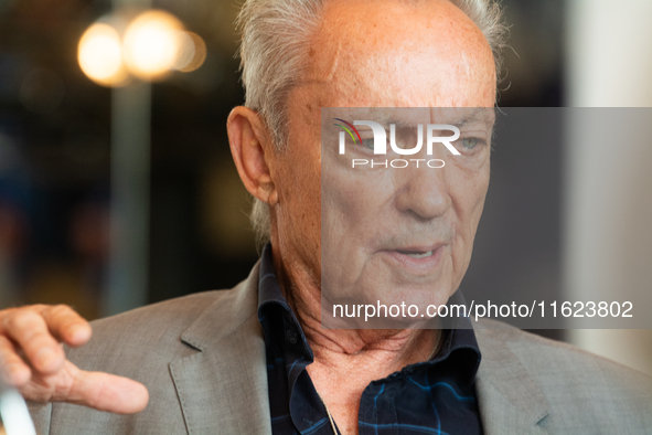 Actor Udo Kier greets Cologne Mayor Henriette Reker for his 80th birthday and signs the Golden Book at Cologne Town Hall in Cologne, Germany...