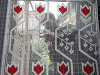 A weaver makes a Jamdani design on a cloth to decorate a ''pandal'' or a temporary platform ahead of the Durga Puja festival in Kolkata, Ind...