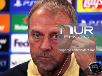 Hansi Flick speaks during the press conference prior to the Champions League match against Young Boys, in Barcelona, Spain, on September 30,...