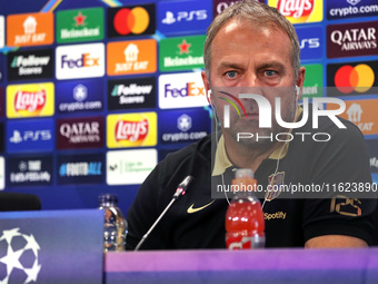 Hansi Flick speaks during the press conference prior to the Champions League match against Young Boys, in Barcelona, Spain, on September 30,...