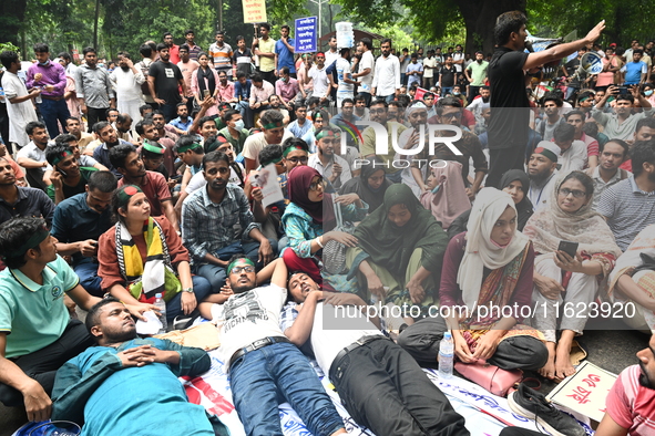 Job seekers stage a demonstration on the road in front of the chief adviser's residence, Jamuna, demanding to raise the age limit for govern...