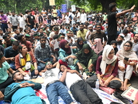 Job seekers stage a demonstration on the road in front of the chief adviser's residence, Jamuna, demanding to raise the age limit for govern...