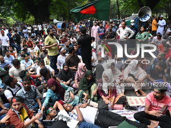 Job seekers stage a demonstration on the road in front of the chief adviser's residence, Jamuna, demanding to raise the age limit for govern...