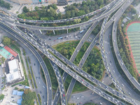 A photo taken in Nanjing, China, on September 30, 2024, shows the traffic flow on the elevated road in the south of Nanjing City, Jiangsu Pr...