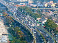 A photo taken in Nanjing, China, on September 30, 2024, shows the traffic flow on the elevated road in the south of Nanjing City, Jiangsu Pr...