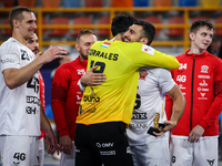 Mohamed Yehia Elderaa celebrates with a teammate after the IHF Men's Handball Club World Championship 2024 preliminary round match between V...