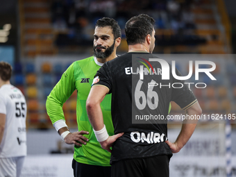 88 Karim HENDAWY and 66 Ahmed ELAHMAR of Zamalek during the IHF Men's Handball Club World Championship 2024 preliminary round match between...