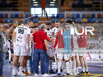 Team Veszprem HC competes during the IHF Men's Handball Club World Championship 2024 preliminary round match between Veszprem HC and Zamalek...