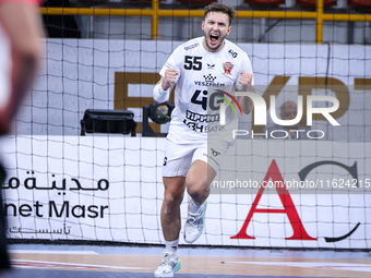 Mikita Vailupau of Veszprem HC participates in the IHF Men's Handball Club World Championship 2024 preliminary round match between Veszprem...