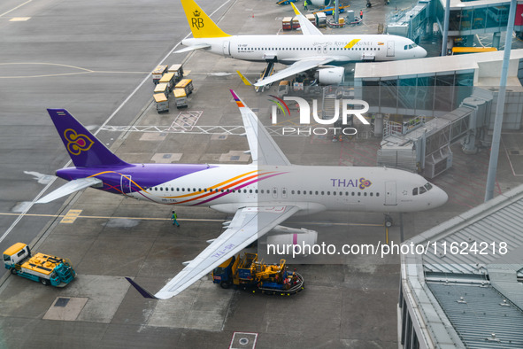 An Airbus A320-232 of Thai Airways is seen at the gate of the Hong Kong International Airport in Hong Kong, China, on September 23, 2024. 