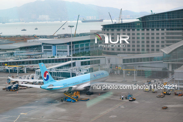 An Airbus A330-323 of Korean Airline is parked at a gate of the Hong Kong International Airport in Hong Kong, China, on September 23, 2024. 