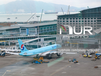 An Airbus A330-323 of Korean Airline is parked at a gate of the Hong Kong International Airport in Hong Kong, China, on September 23, 2024....