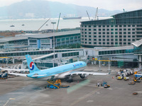 An Airbus A330-323 of Korean Airline is parked at a gate of the Hong Kong International Airport in Hong Kong, China, on September 23, 2024....