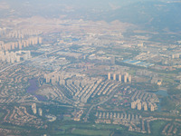 Building rows are seen from a plane on approach to Chongqing, China, on September 23, 2024. (