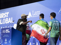 Will.i.am, frontman of the Black Eyed Peas, presents medals during the FIRST Global Challenge 2024, the ''Olympics'' of Robotics, in Athens,...