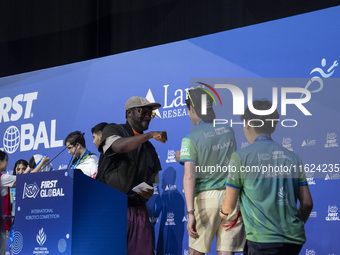 Will.i.am, frontman of the Black Eyed Peas, presents medals during the FIRST Global Challenge 2024, the ''Olympics'' of Robotics, in Athens,...