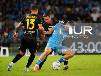 Khvicha K'varatskhelia (SSC Napoli) and Armando Izzo (AC Monza) during the Italian championship Serie A football match between SSC Napoli an...