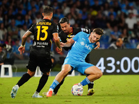 Khvicha K'varatskhelia (SSC Napoli) and Armando Izzo (AC Monza) during the Italian championship Serie A football match between SSC Napoli an...