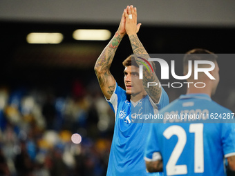 Giovanni Di Lorenzo claps his hands to tifosi during the Italian championship Serie A football match between SSC Napoli and AC Monza in Napl...