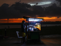 A street food vendor waits for customers at Galle Face promenade in Colombo, Sri Lanka, on September 30, 2024. (