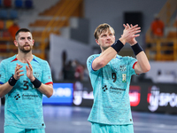 Jonathan Carlsbogard and Antonio Bazan Legasa of FC Barcelona after the 17th IHF Men's Club World Championship 2024 preliminary round match...