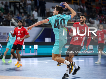 Manuel Ortega Ezcurdia of FC Barcelona tries to score during the 17th IHF Men's Club World Championship 2024 preliminary round match between...