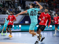 Manuel Ortega Ezcurdia of FC Barcelona tries to score during the 17th IHF Men's Club World Championship 2024 preliminary round match between...