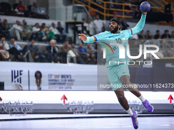 Dika Mem of FC Barcelona tries to score during the 17th IHF Men's Club World Championship 2024 preliminary round match between Al Ahly Sport...