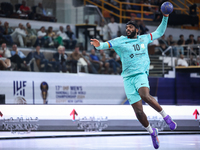 Dika Mem of FC Barcelona tries to score during the 17th IHF Men's Club World Championship 2024 preliminary round match between Al Ahly Sport...