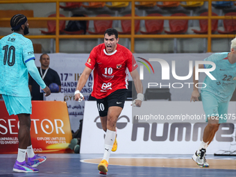 Abd Elrahman Abdou of Al Ahly SC celebrates during the 17th IHF Men's Club World Championship 2024 preliminary round match between Al Ahly S...