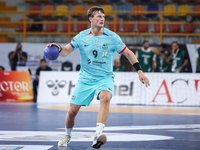 Jonathan Carlsbogard of FC Barcelona tries to score during the 17th IHF Men's Club World Championship 2024 preliminary round match between A...