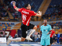 Omar Hassan of Al Ahly SC tries to score during the 17th IHF Men's Handball Club World Championship 2024 preliminary round match between Al...