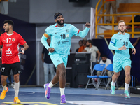 Dika Mem of FC Barcelona celebrates during the 17th IHF Men's Club World Championship 2024 preliminary round match between Al Ahly Sporting...