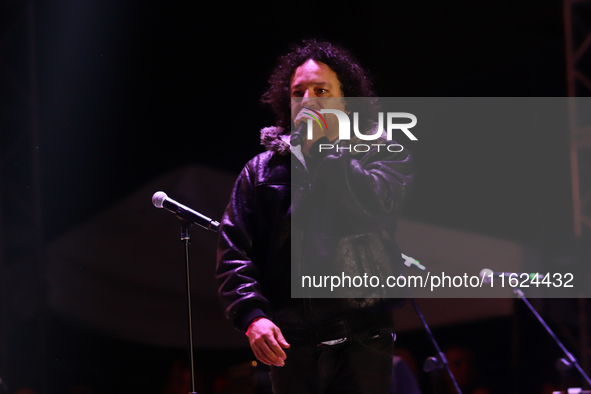 Members of the Orquesta Internacional band perform during the ''Hasta Siempre Presidente Fest'' at the Monumento to the Revolution in Mexico...