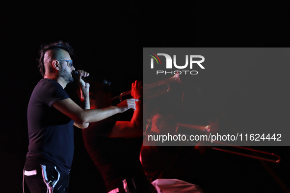 Arturo Ruelas, known as ''Pinocho,'' vocalist of the Los Estramboticos band, performs during the ''Hasta Siempre Presidente Fest'' at the Mo...