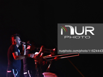 Arturo Ruelas, known as ''Pinocho,'' vocalist of the Los Estramboticos band, performs during the ''Hasta Siempre Presidente Fest'' at the Mo...