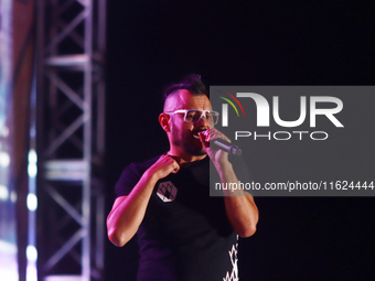 Arturo Ruelas, known as ''Pinocho,'' vocalist of the Los Estramboticos band, performs during the ''Hasta Siempre Presidente Fest'' at the Mo...