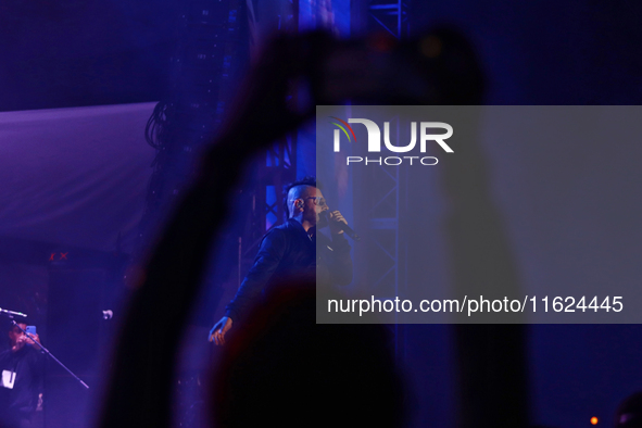 Arturo Ruelas, known as ''Pinocho,'' vocalist of the Los Estramboticos band, performs during the ''Hasta Siempre Presidente Fest'' at the Mo...