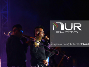 Arturo Ruelas, known as ''Pinocho,'' vocalist of the Los Estramboticos band, performs during the ''Hasta Siempre Presidente Fest'' at the Mo...