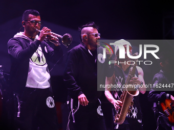 Arturo Ruelas, known as ''Pinocho,'' vocalist of the Los Estramboticos band, performs during the ''Hasta Siempre Presidente Fest'' at the Mo...