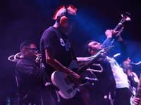 David Sanchez ''Chadou,'' guitarist of the Los Estramboticos band, performs during the ''Hasta Siempre Presidente Fest'' at the Monumento to...