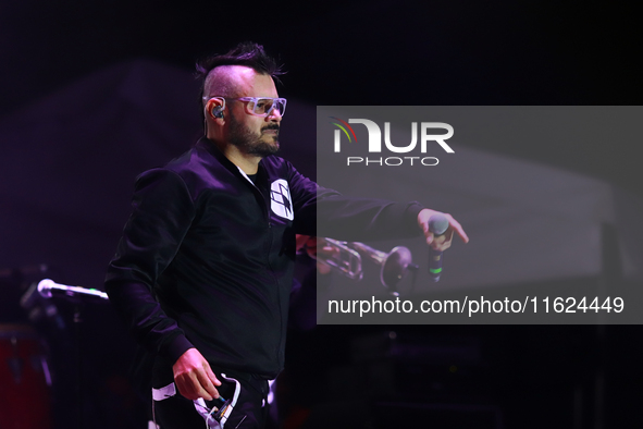 Arturo Ruelas, known as ''Pinocho,'' vocalist of the Los Estramboticos band, performs during the ''Hasta Siempre Presidente Fest'' at the Mo...