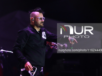 Arturo Ruelas, known as ''Pinocho,'' vocalist of the Los Estramboticos band, performs during the ''Hasta Siempre Presidente Fest'' at the Mo...