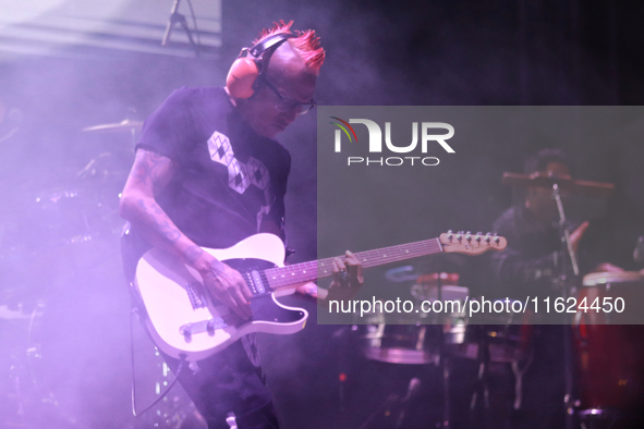 David Sanchez ''Chadou,'' guitarist of the Los Estramboticos band, performs during the ''Hasta Siempre Presidente Fest'' at the Monumento to...