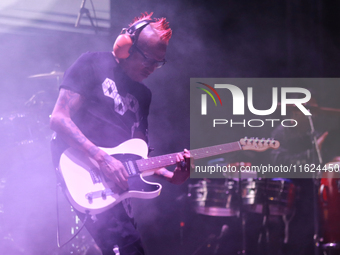 David Sanchez ''Chadou,'' guitarist of the Los Estramboticos band, performs during the ''Hasta Siempre Presidente Fest'' at the Monumento to...