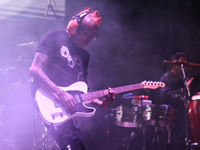 David Sanchez ''Chadou,'' guitarist of the Los Estramboticos band, performs during the ''Hasta Siempre Presidente Fest'' at the Monumento to...