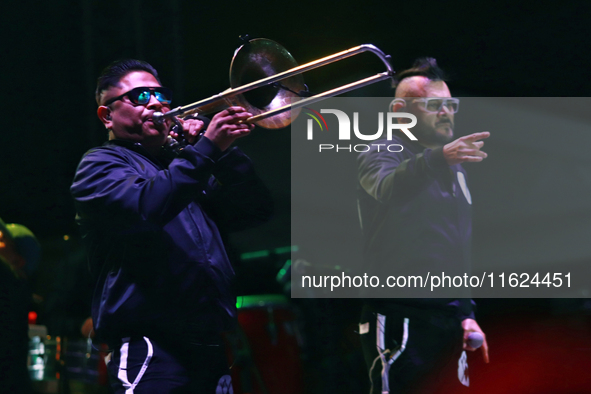 A member of the Los Estramboticos band performs during the ''Hasta Siempre Presidente Fest'' at the Monumento to the Revolution in Mexico Ci...