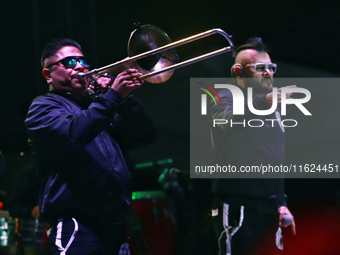 A member of the Los Estramboticos band performs during the ''Hasta Siempre Presidente Fest'' at the Monumento to the Revolution in Mexico Ci...